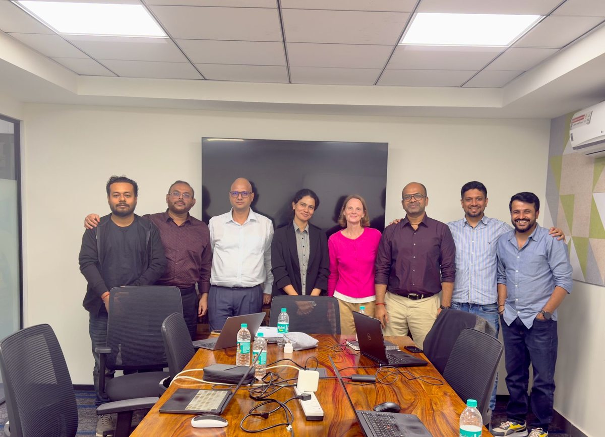 SafePaaS engineering team together in a working session